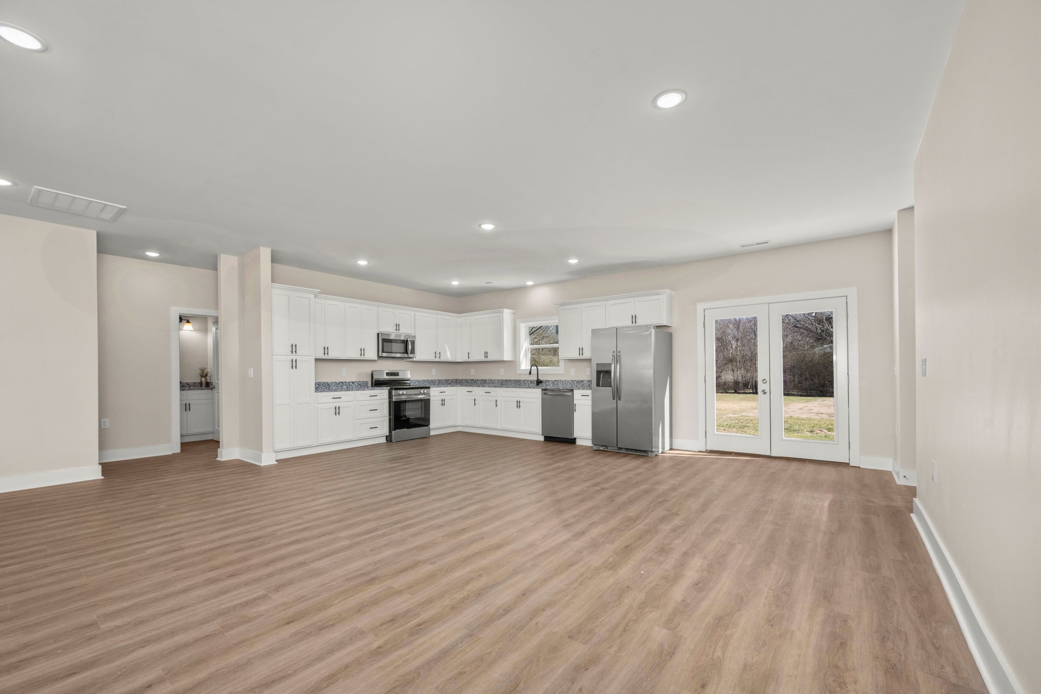 254 Flintville Road Flintville, TN 37335 - Photo 9 of 38 a view of a kitchen with wooden floor