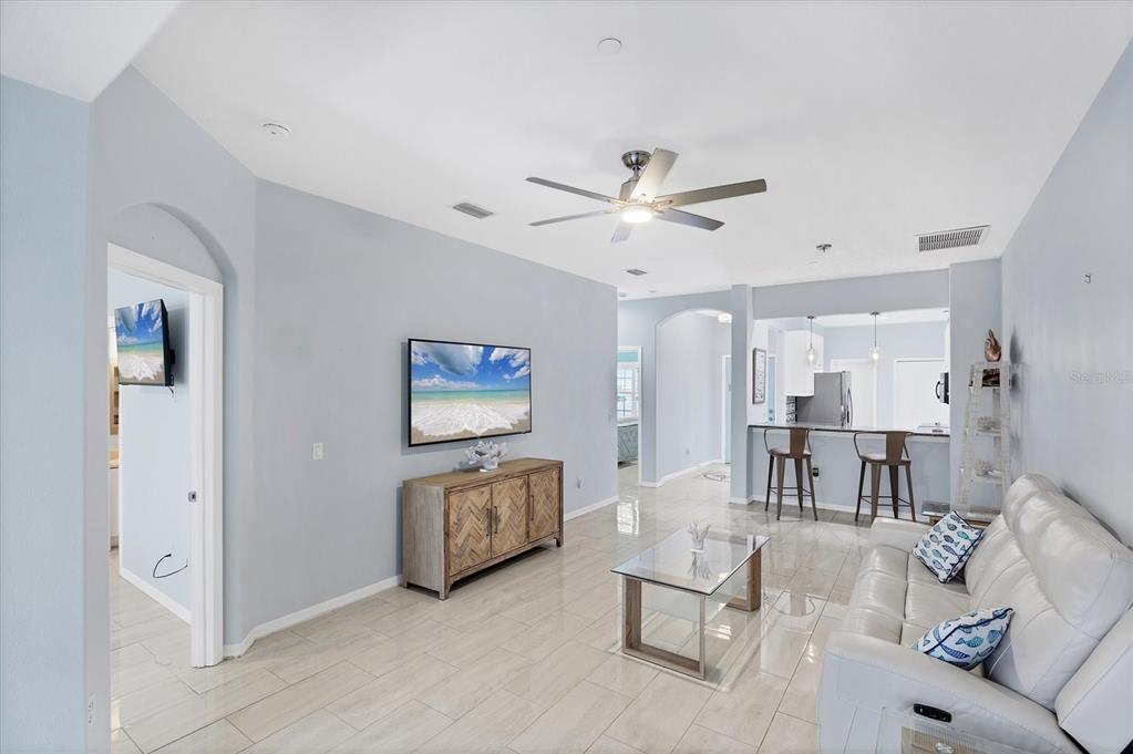 640 Back 9 Drive Venice, FL 34285 - Photo 23 of 54 a living room with furniture and a large window