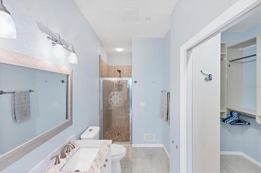 640 Back 9 Drive Venice, FL 34285 - Photo 42 of 54 a bathroom with a sink a toilet and shower