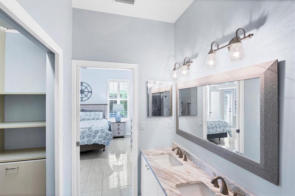 640 Back 9 Drive Venice, FL 34285 - Photo 45 of 54 a bathroom with a tub sink and mirror