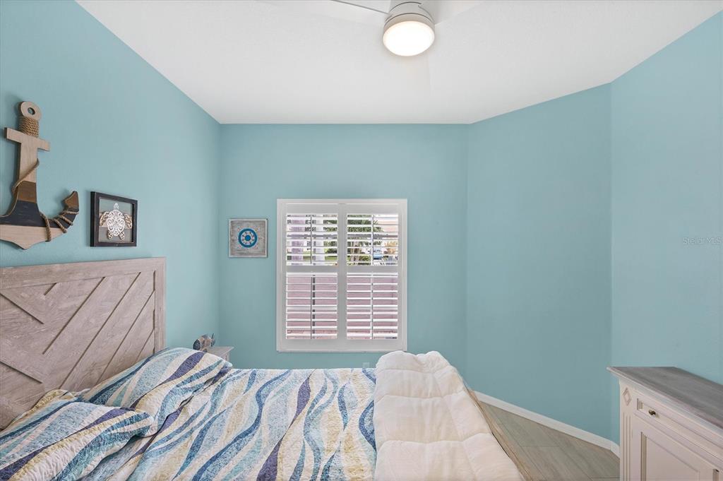 640 Back 9 Drive Venice, FL 34285 - Photo 49 of 54 a bedroom with a bed and a window