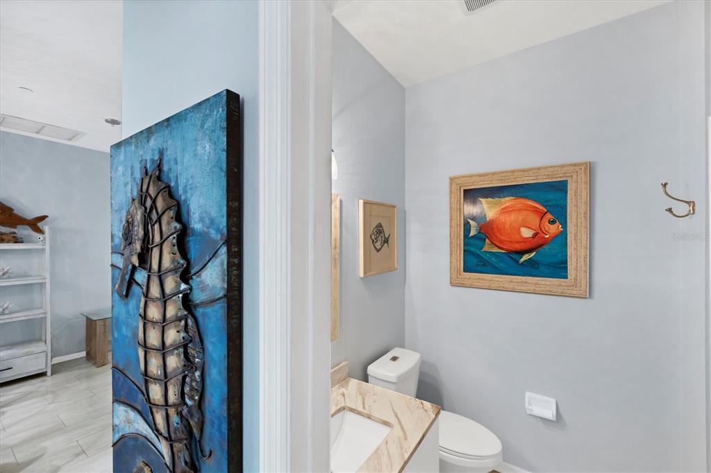 640 Back 9 Drive Venice, FL 34285 - Photo 51 of 54 a bathroom with a painting on the wall and a shower