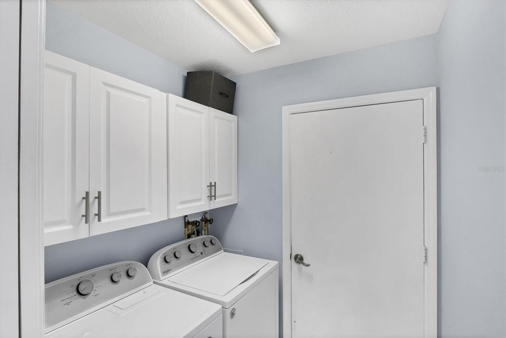 640 Back 9 Drive Venice, FL 34285 - Photo 54 of 54 a utility room with dryer and washer