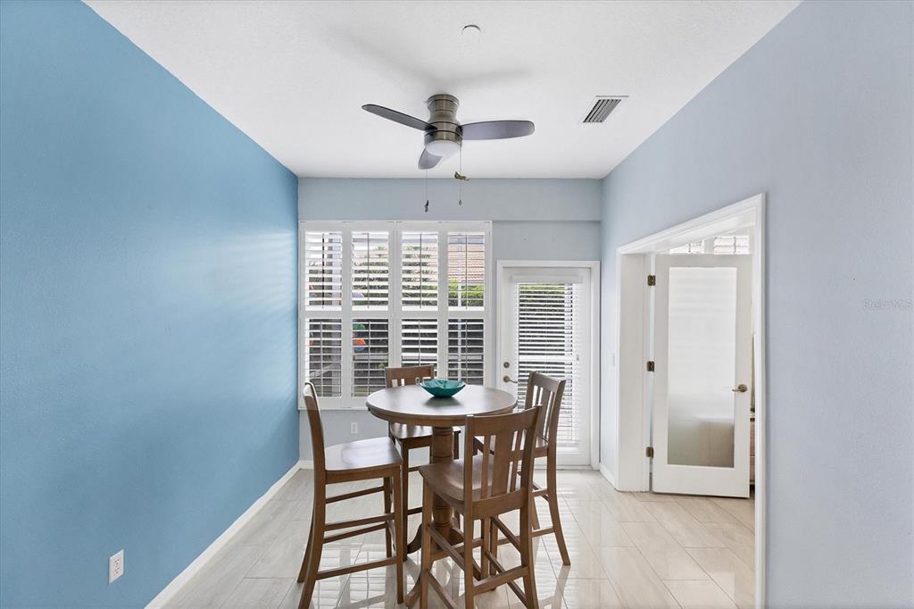 640 Back 9 Drive Venice, FL 34285 - Photo 9 of 54 a dining room with furniture and window