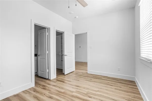 a view of a room that has a window in it