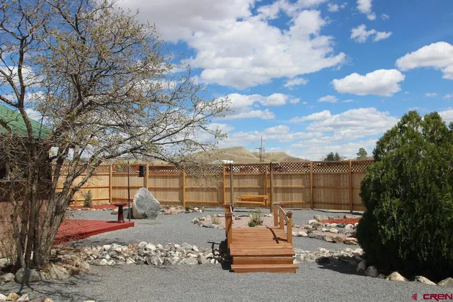 a view of a parking space with city view