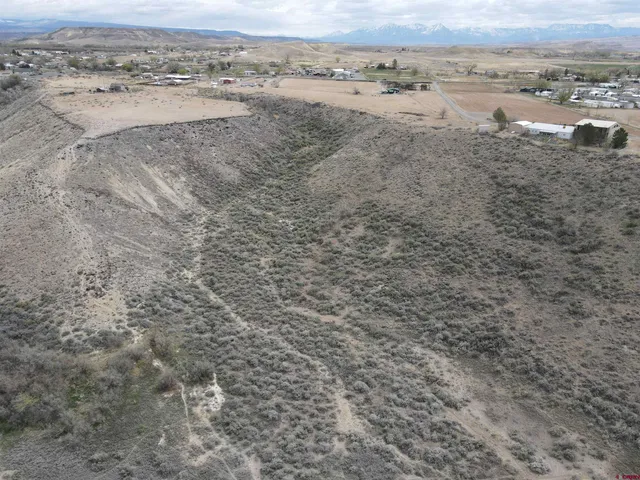 an aerial view of beach and yard
