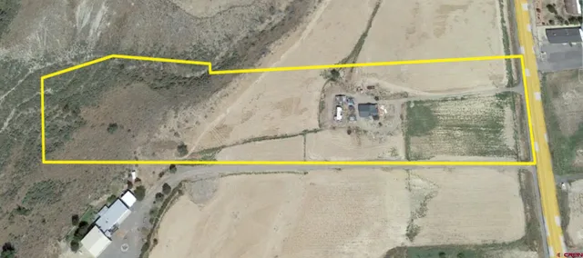 a view of a swimming pool with a balcony