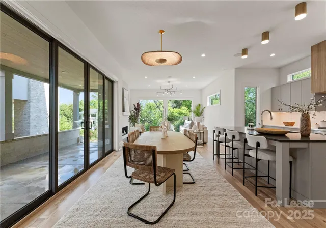 a very nice looking room with furniture and a large window