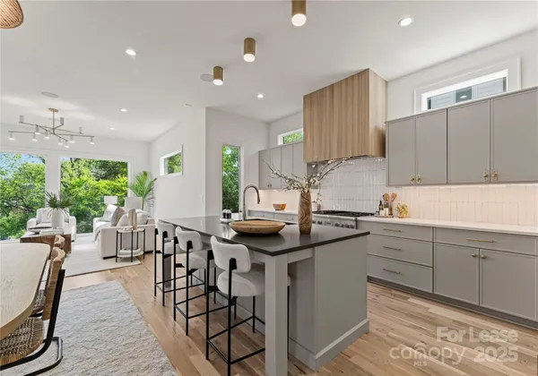 a kitchen with sink a counter top space and appliances