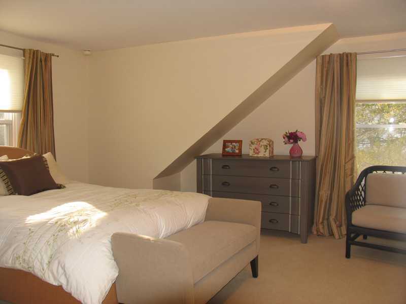 14 Bonwit Road Riverside, CT 06878 - Photo 10 of 13 a bedroom with a bed couch and a window