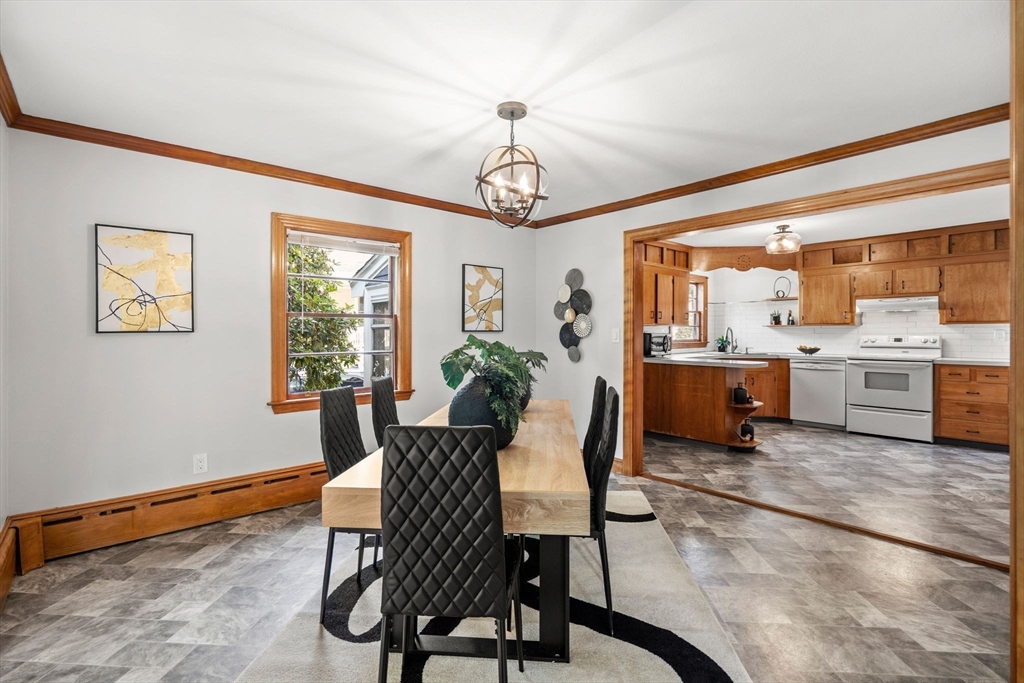 58 Spring Street Wakefield, MA 01880 - Photo 13 of 41 a dining room with furniture and window