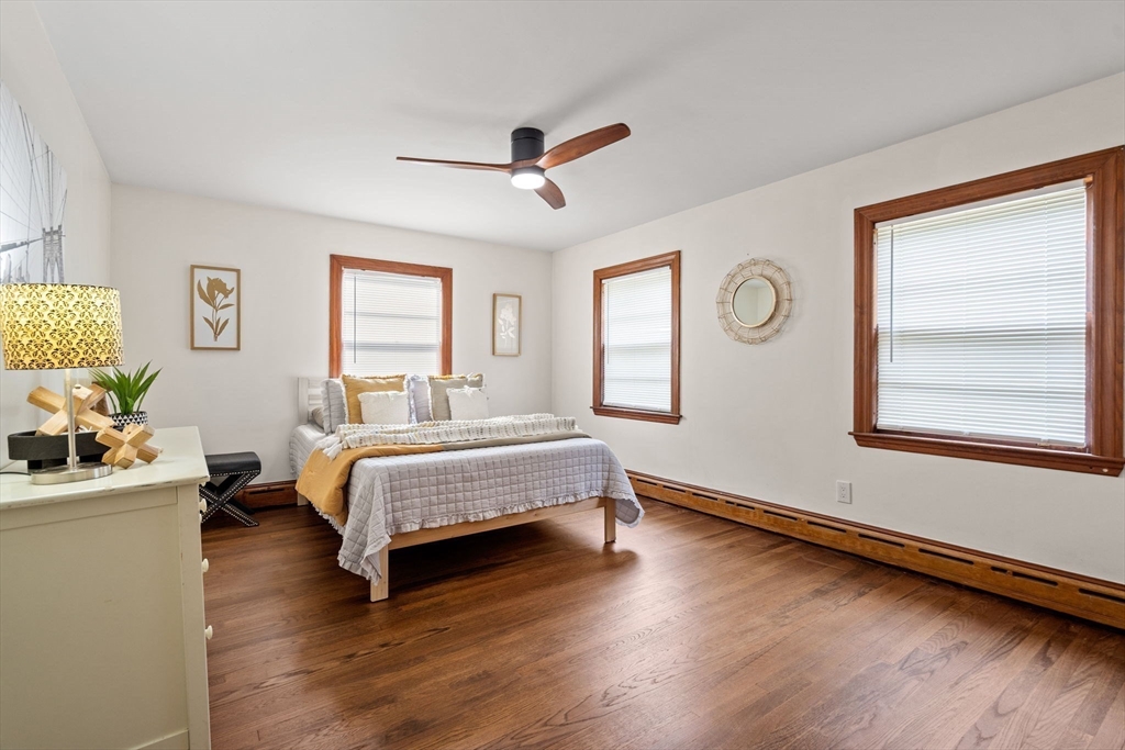 58 Spring Street Wakefield, MA 01880 - Photo 18 of 41 a bed room with a bed and a window