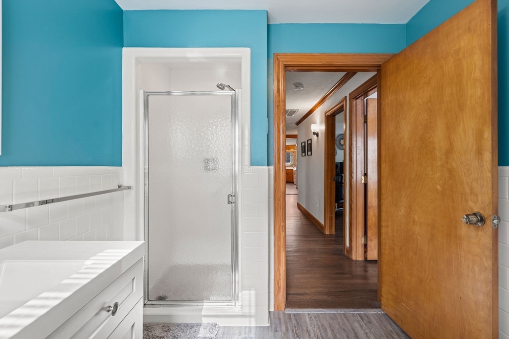58 Spring Street Wakefield, MA 01880 - Photo 24 of 41 a bathroom with a sink and a shower