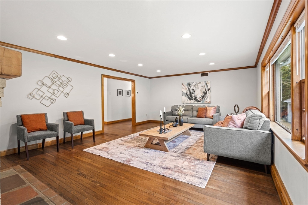 58 Spring Street Wakefield, MA 01880 - Photo 5 of 41 a living room with furniture and a table