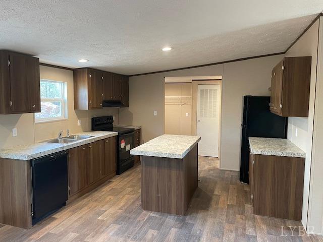 470 Central Church Road Appomattox, VA 24522 - Photo 4 of 12 a kitchen with stainless steel appliances granite countertop a sink stove and refrigerator