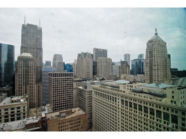 235 West Van Buren Street, Unit 3520 Chicago, IL 60607 - Photo 9 of 17 a view of city with tall buildings