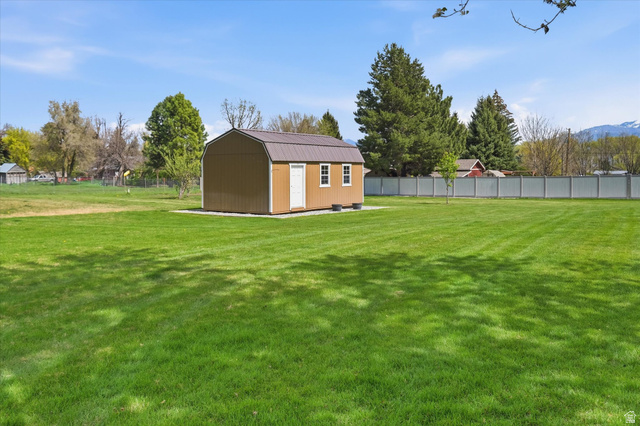 45 West 100 South Mendon, UT 84325 - Photo 43 of 64 Fenced yard with a storage shed