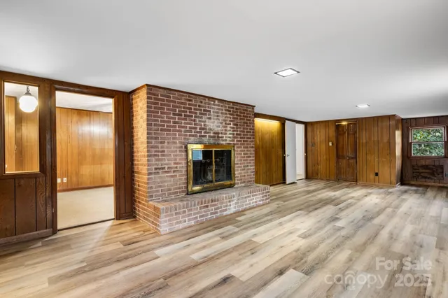 a bathroom with a sink a toilet and shower curtain