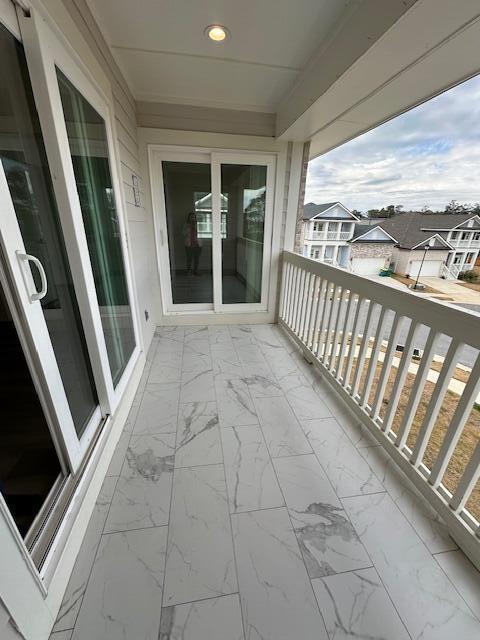 512 Harborview Circle Niceville, FL 32578 - Photo 19 of 27 a view of a porch with wooden floor and fence
