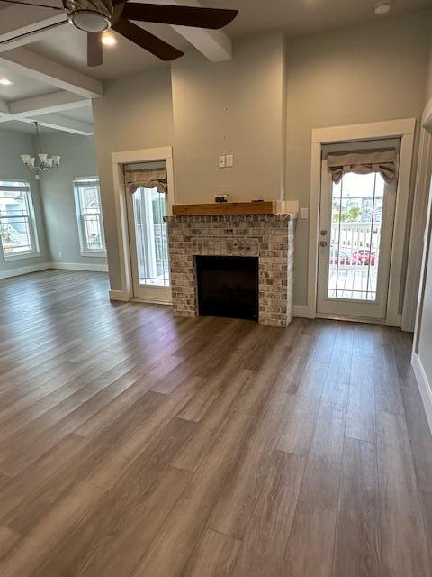 512 Harborview Circle Niceville, FL 32578 - Photo 2 of 27 wooden floor fireplace and natural light in room