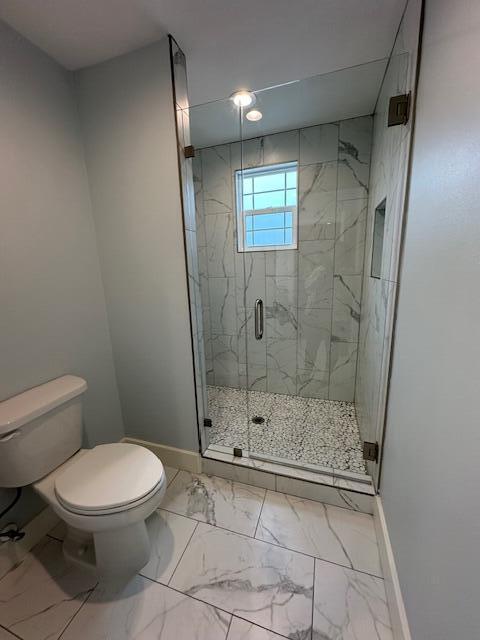 512 Harborview Circle Niceville, FL 32578 - Photo 25 of 27 a bathroom with a toilet and a shower