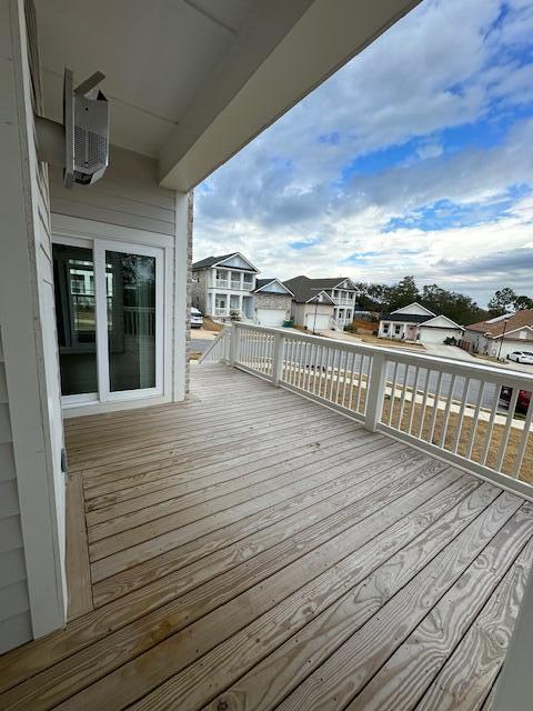 512 Harborview Circle Niceville, FL 32578 - Photo 9 of 27 a view of a balcony with wooden floor