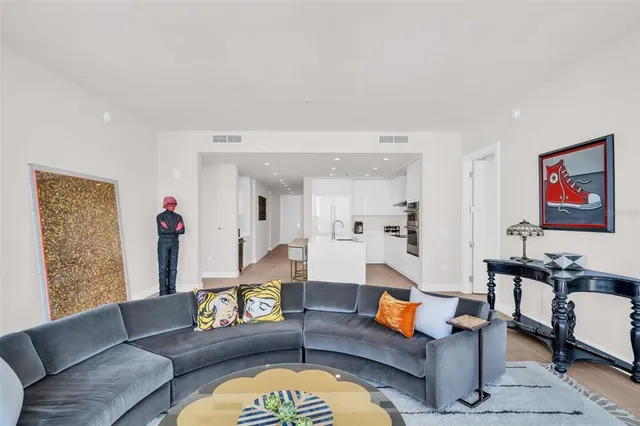 a living room with furniture and a table