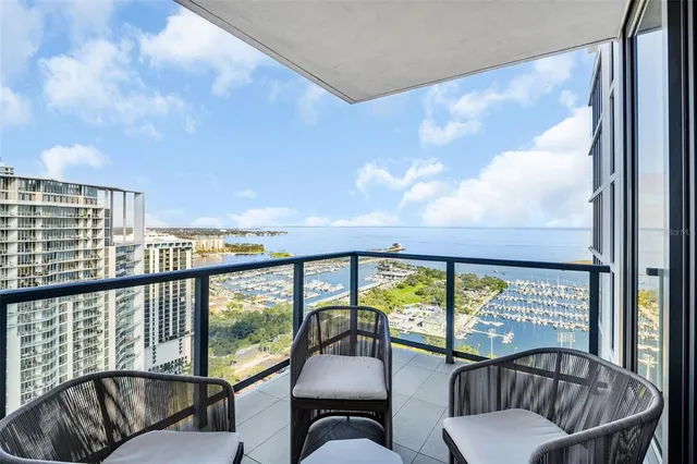 a bathroom with a shower and a sink