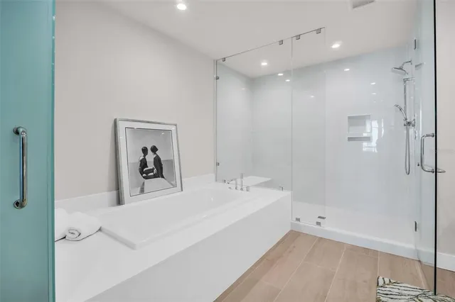 a living room with furniture and a mirror