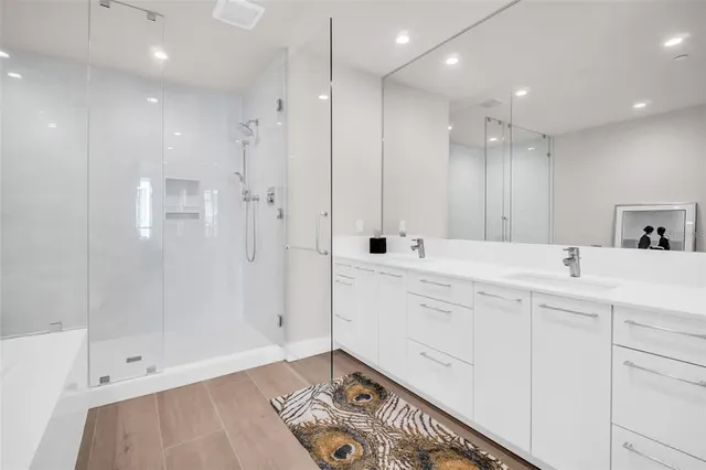 a view of an entryway with wooden floor and windows