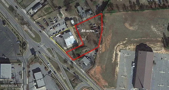 a view of a street with sitting area