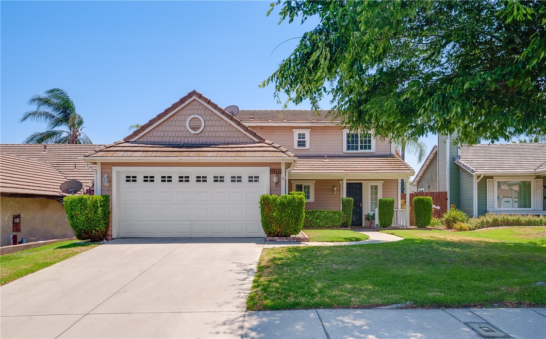 10783 Sundance Drive Rancho Cucamonga, CA 91730 - Photo 1 of 1 a front view of a house with a garden and plants