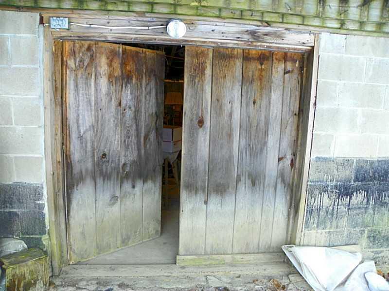 12 Jackson Road Poland, ME 04274 - Photo 23 of 31 Exterior Back. Doors to walk-out...