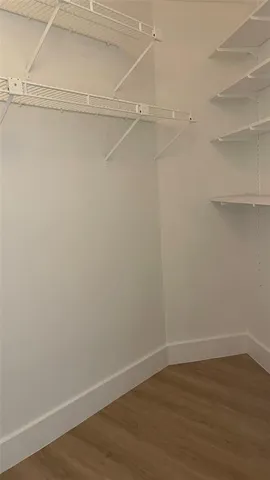 a view of a room with racks on the wall