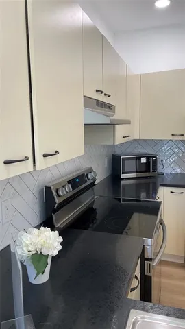 a closeup of a sink and a window