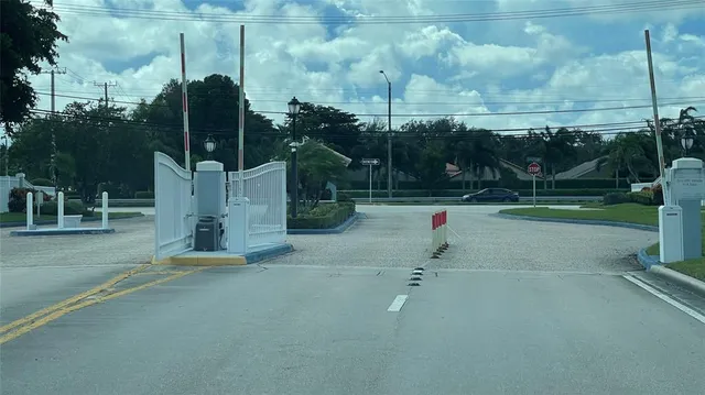a view of multiple house with a garden