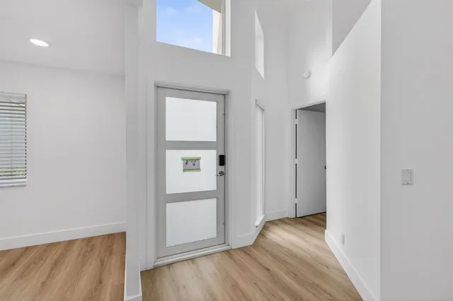 a view of wooden floor in an empty room
