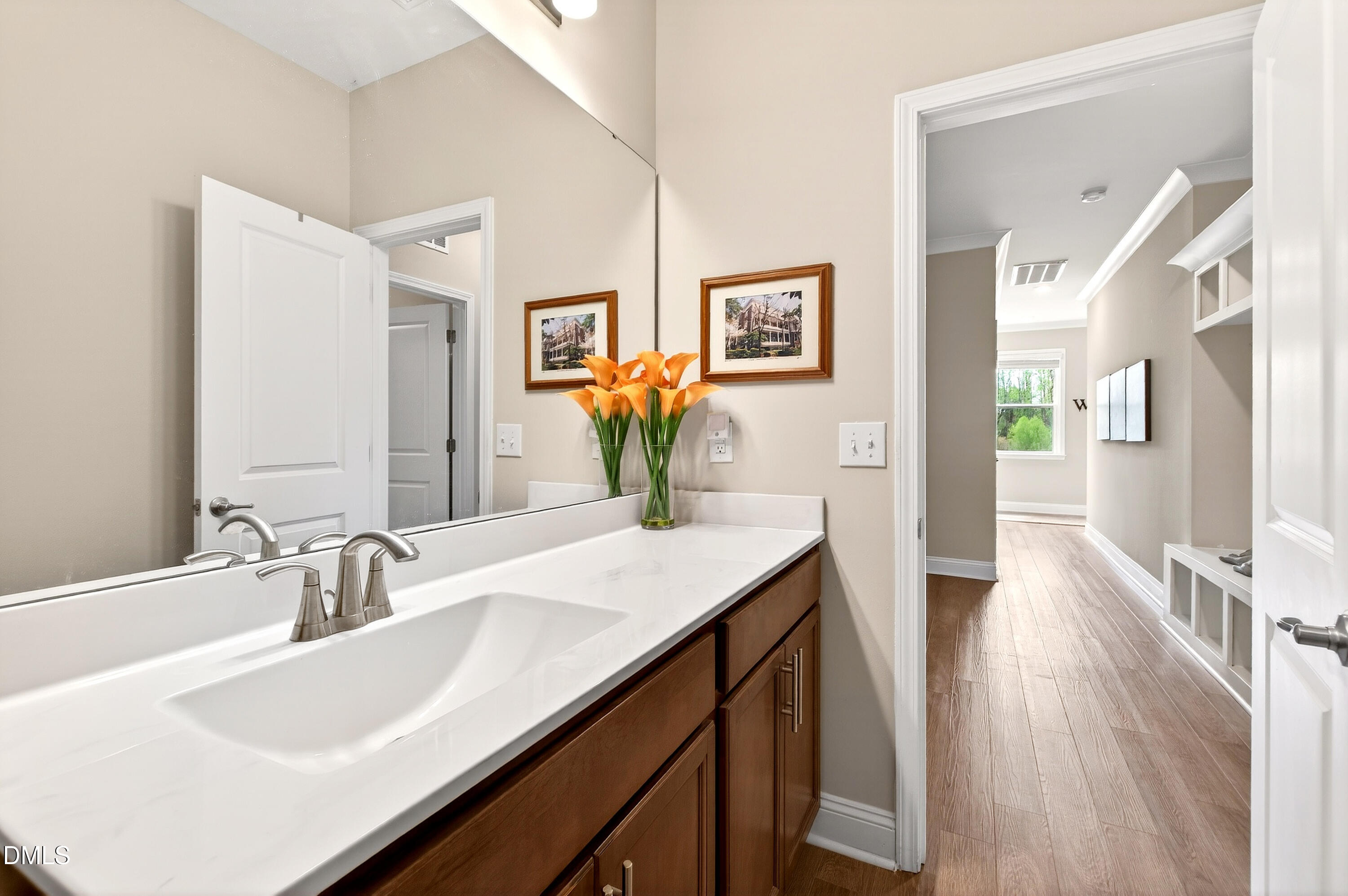 339 Summer Ranch Drive Fuquay-Varina, NC 27526 - Photo 27 of 42 a bathroom with a sink and a mirror
