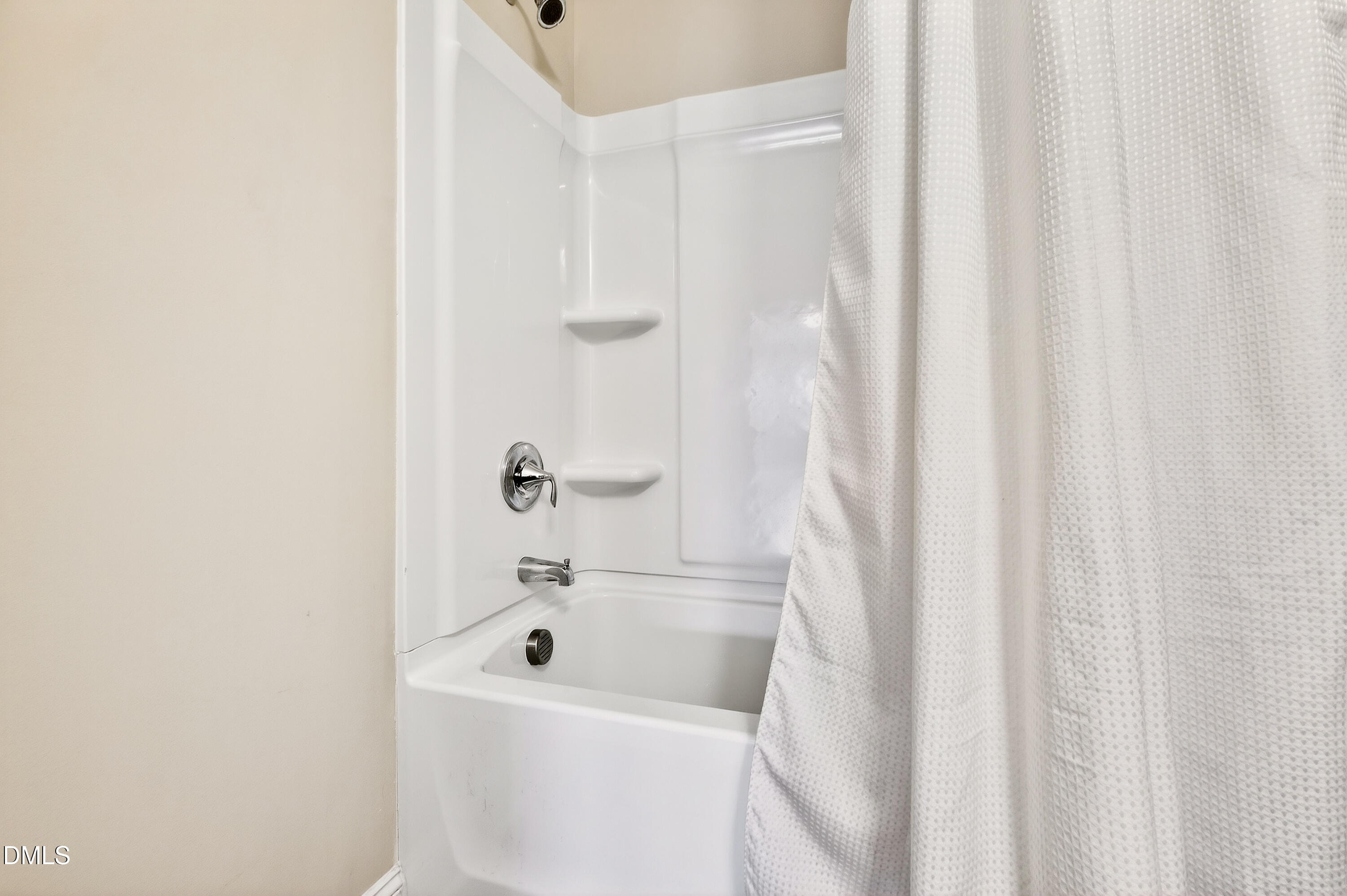 339 Summer Ranch Drive Fuquay-Varina, NC 27526 - Photo 28 of 42 a bathroom with a sink a toilet and shower curtain