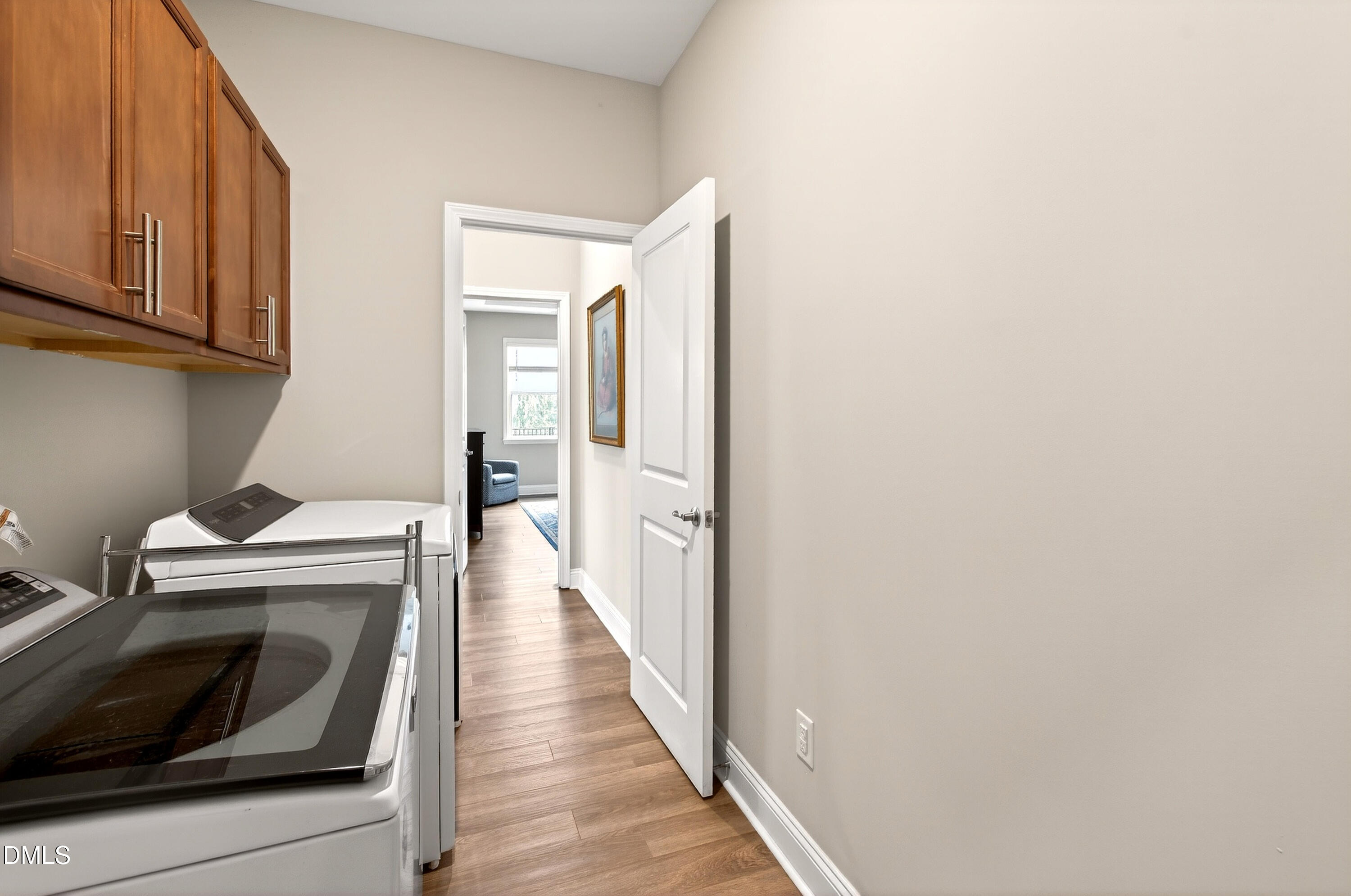 339 Summer Ranch Drive Fuquay-Varina, NC 27526 - Photo 31 of 42 a view of a hallway with washer and dryer