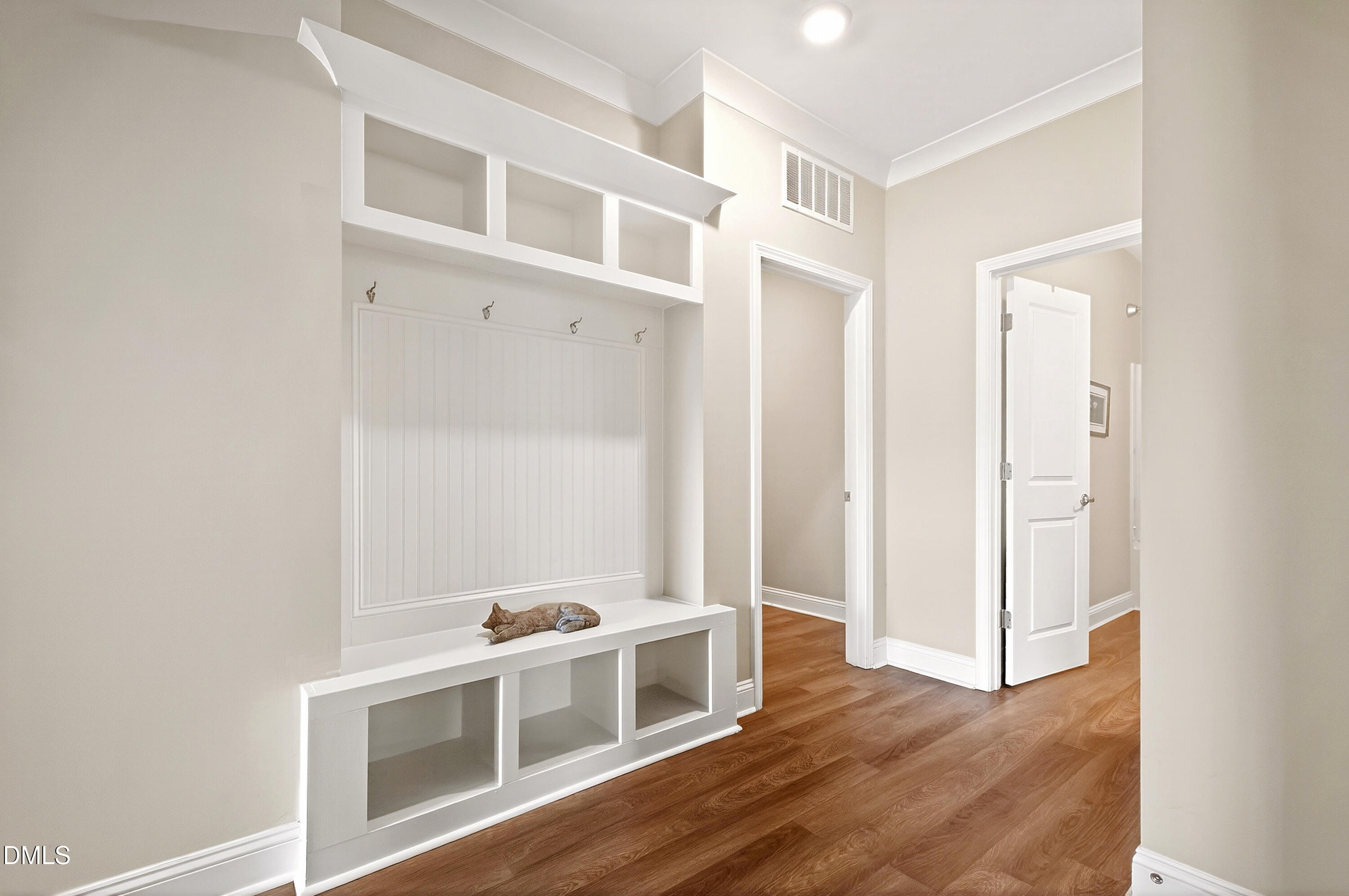 339 Summer Ranch Drive Fuquay-Varina, NC 27526 - Photo 32 of 42 a view of a kitchen with wooden floor and electronic appliances