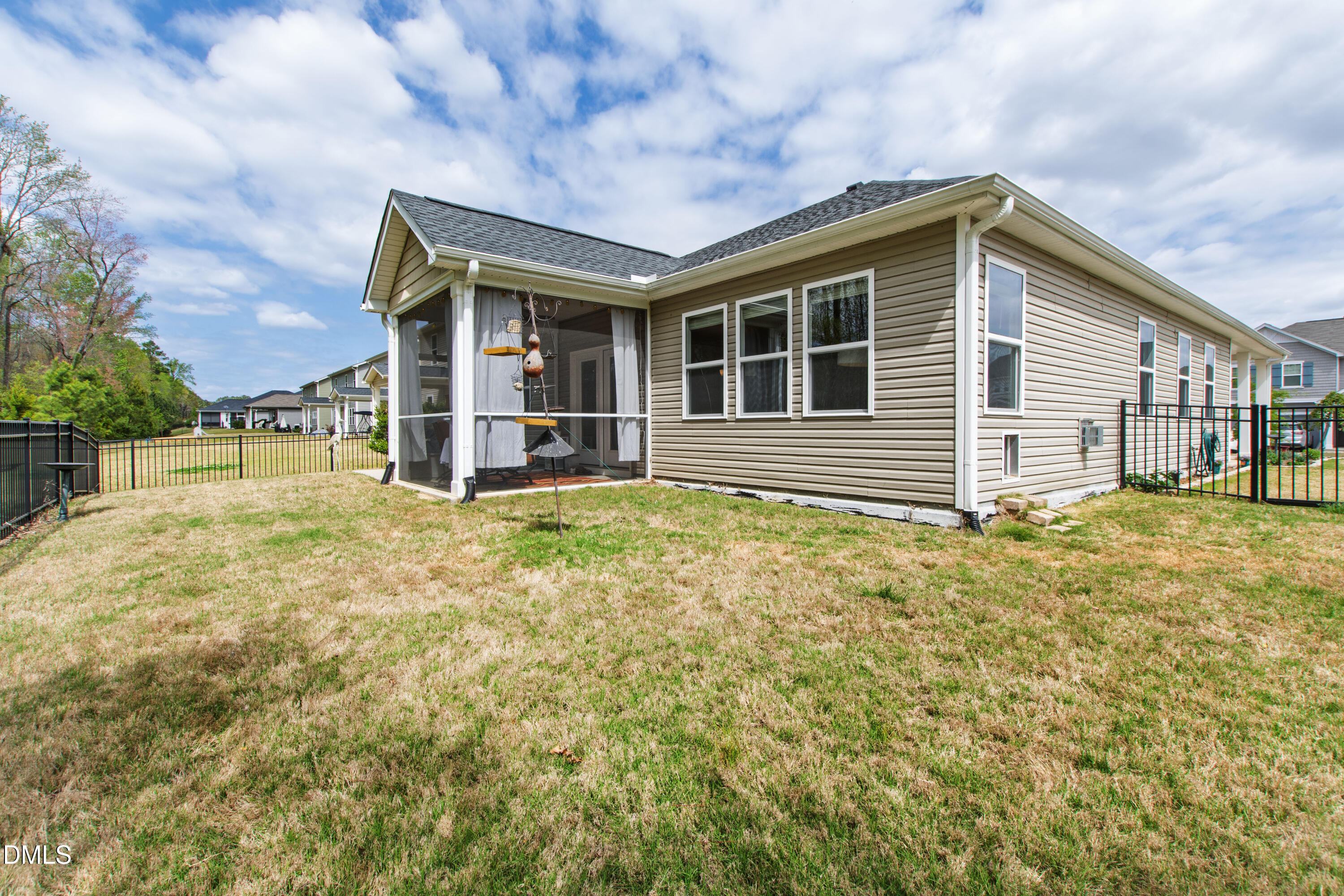 339 Summer Ranch Drive Fuquay-Varina, NC 27526 - Photo 35 of 42 a front view of a house with a yard