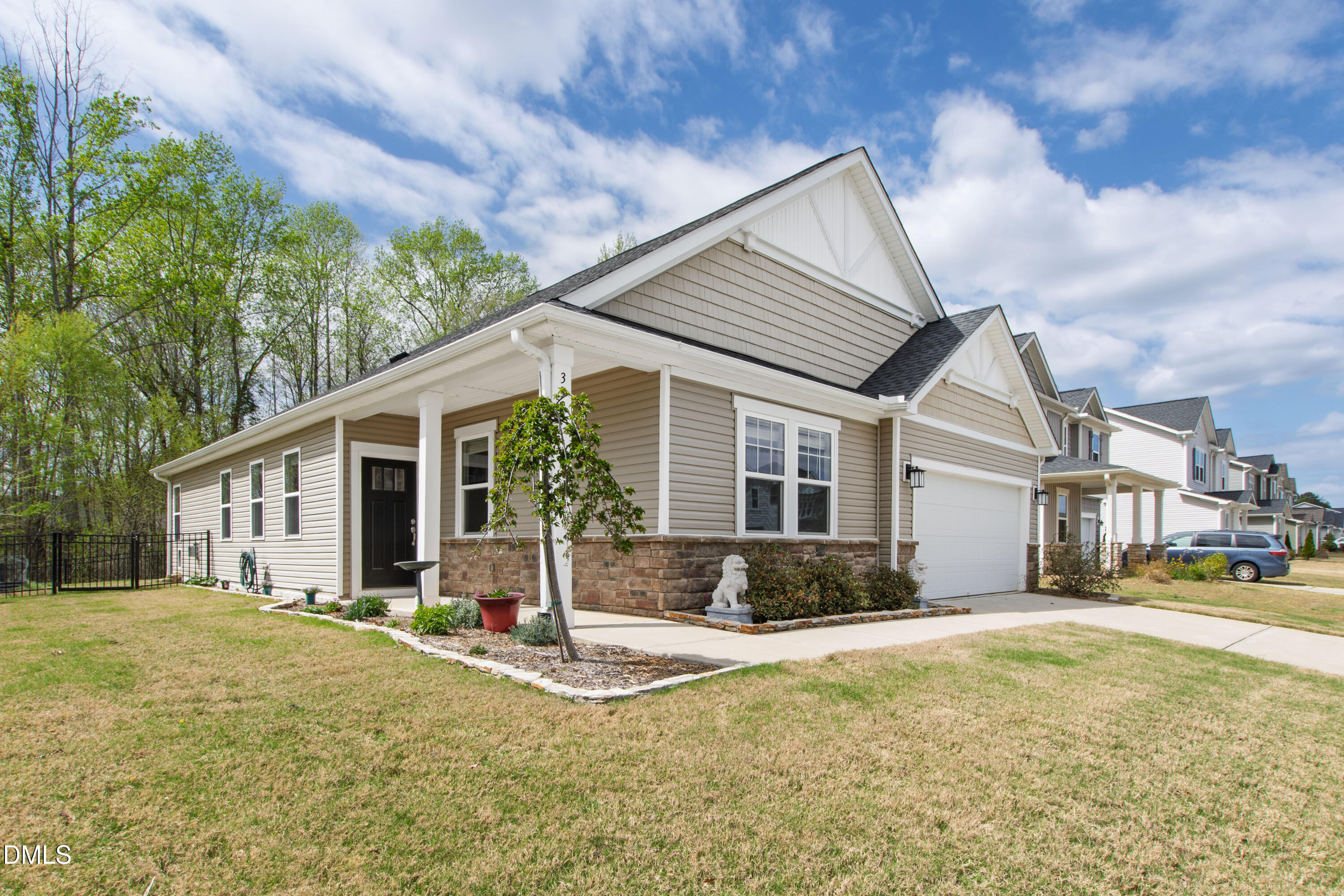 339 Summer Ranch Drive Fuquay-Varina, NC 27526 - Photo 37 of 42 a view of a house with a yard and plants