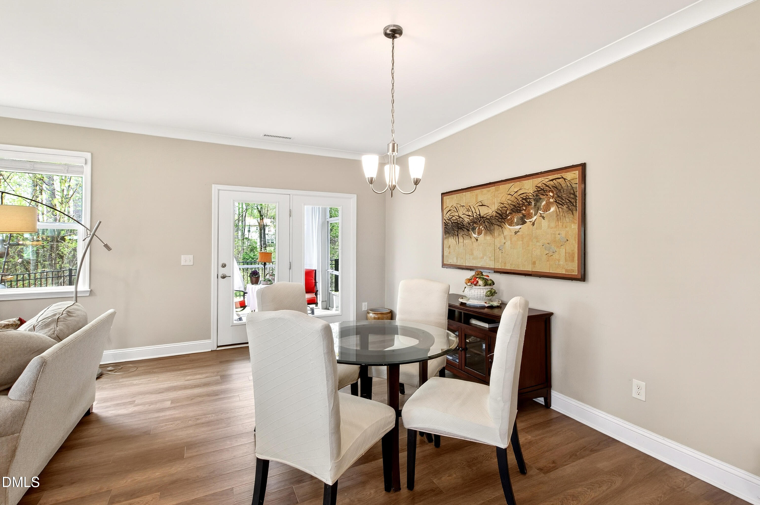 339 Summer Ranch Drive Fuquay-Varina, NC 27526 - Photo 4 of 42 a view of a dining room with furniture window and wooden floor