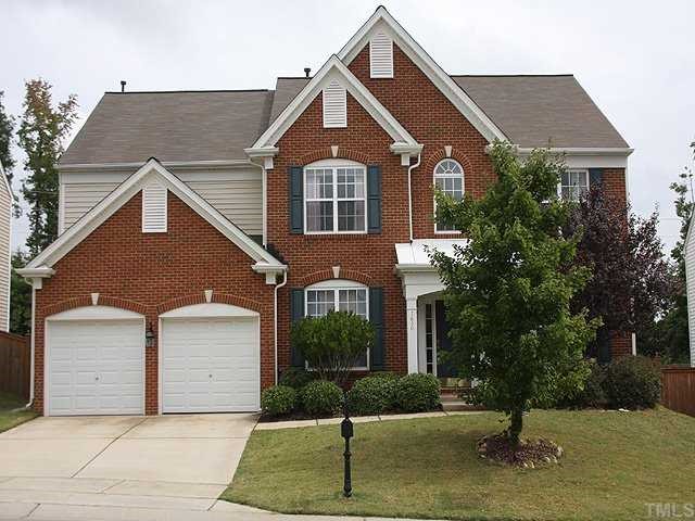 7620 Silver View Lane Raleigh, NC 27613 - Photo 1 of 12 a front view of a house with a yard