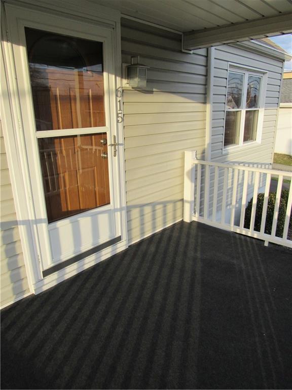 615 Unity Street Latrobe, PA 15650 - Photo 2 of 24 Great front porch to relax & watch the sun set.