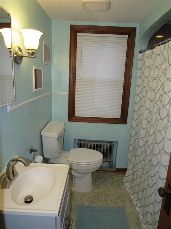 615 Unity Street Latrobe, PA 15650 - Photo 12 of 24 Full bath with new fixtures, toilet & tiled shower surround