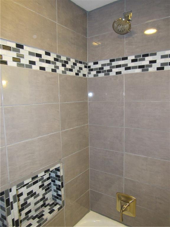 615 Unity Street Latrobe, PA 15650 - Photo 13 of 24 Beautiful tiled shower surround with new fixtures.
