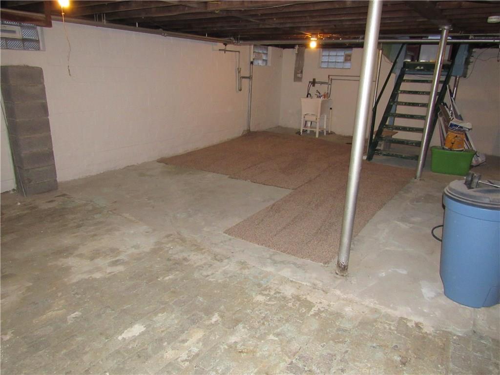 615 Unity Street Latrobe, PA 15650 - Photo 18 of 24 Unfinished HUGE basement with freshly painted Drylok walls.